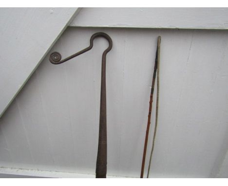 Vintage shepherd's crook and carriage whip with makers name