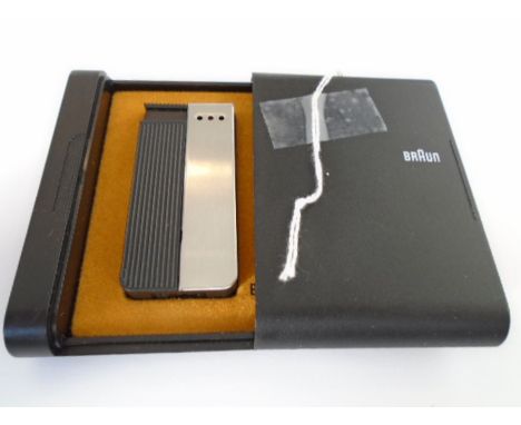 A Braun lighter in a box 