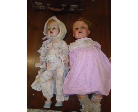 Vintage bisque doll by Koppelsdoir Germay, another vintage doll. both as found