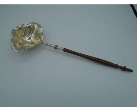 A vintage wooden handled silver plate ladle  