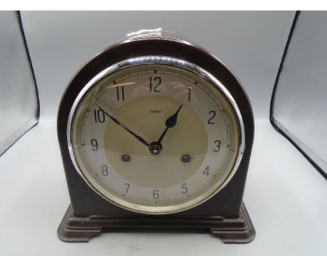 A quality bakelite mantle clock by Enfields of London, striking with key