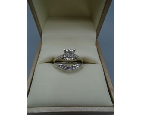 Diamond white gold ring and 9ct white gold wedding ring from Fraser Heart (original receipt in box) size L