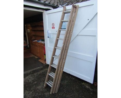 Extending wooden and alloy ladder