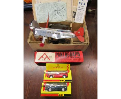Vintage 'modern wonders' flying model monoplane, 2 in box as found plus 2 boxed shell model cars and a pantograph in original
