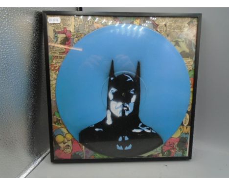 A batman record/ comic print - a record mounted onto Batman comic in a frame