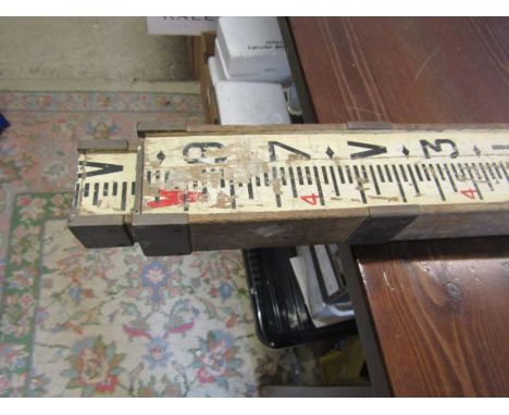 Vintage wooden surveyors measuring stick 