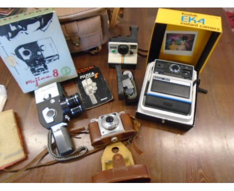 Vintage camera's- FUJICA 8, palaroid instamatic camera, kodak instant camera, a vintage cased camera  