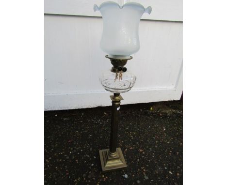 Oil lamp with glass font, white  tulip shade and brass base
