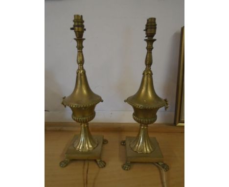 A pair of Brass lamp bases 47cm tall