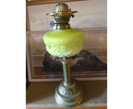 Oil lamp with brass stand and yellow glass, no funnel