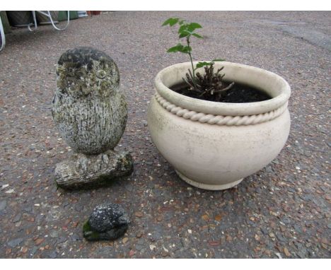 Ceramic plant pot with concrete owl and hedgehog garden ornaments 
