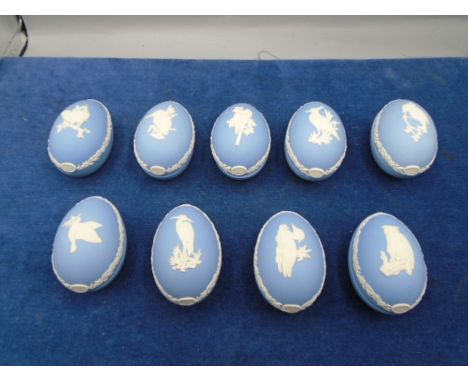 9 Wedgwood blue and white Jasper Easter Egg trinket boxes for years 1977 - 1985 (7 are boxed)
