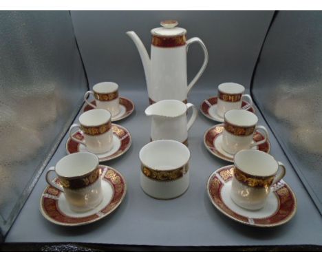 'ELIZABETHAN' TEA SET COMPRISING A TEAPOT AND 6 CUPS AND SAUCERS, MILK JUG AND SUGAR BOWL