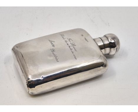 A silver hip flask, by William Neale, Chester 1905, bayonet fitting, engraved presentation details (split to side). (122.5g)&