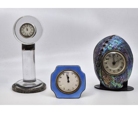 Three various desk clocks, to include; a silver and blue guilloche enamel easel back desk clock, Birmingham 1930, no makers m