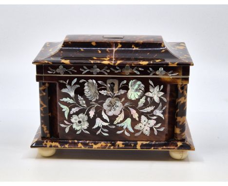 A Regency tortoiseshell, ivory banded and mother of pearl inlaid tea caddy, c.1815, of sarcophagus form, with pillars to all 
