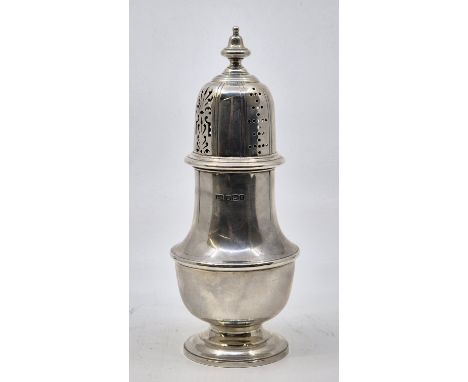 A large silver baluster form caster, by Atkin Brothers, Sheffield 1911, with bayonet fitting pierced top, height 20cm. (296.1
