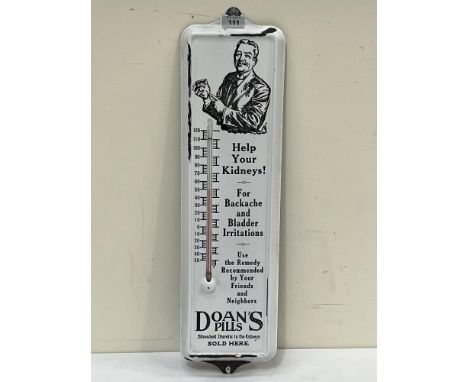 AN enamel sign for Doan"s Pills, with integral thermometer. 24" high