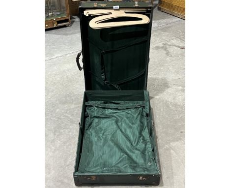 A cabin trunk with fitted interior.