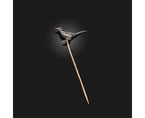 A late 19th century diamond-set stickpin, in the form of a pheasant pavé-set with rose-cut diamonds and a cabochon ruby eye i