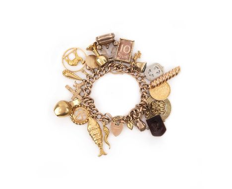 A charm bracelet, the curb link bracelet in 9ct gold, suspending a series of 25 charms including a 1907 sovereign coin pendan