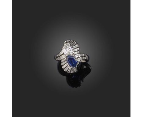 An Art Deco sapphire and diamond ring, 1930s, of toi-et-moi design, each side of palmette design, set with a shield-shaped sa