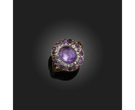 A George III amethyst and diamond cluster ring, set with a central oval amethyst within concentric surround of diamonds and a