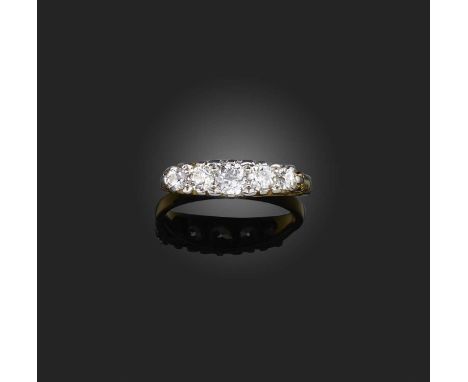 A five-stone diamond ring, set with a sequence of five graduated brilliant-cut diamonds totalling approximately 0.75 carats, 