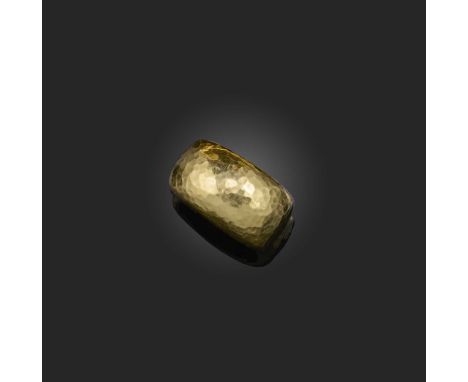 Φ Φ Andrew Grima, a gold ring, of bombé design with a hammered finish, size M1/2, signed Grima, stamped 750