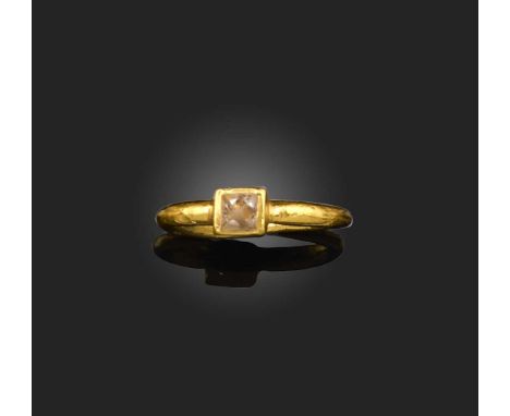 An antique gold and rock crystal ring, possibly 16th/17th century or earlier, set with a point-cut rock crystal in a box coll