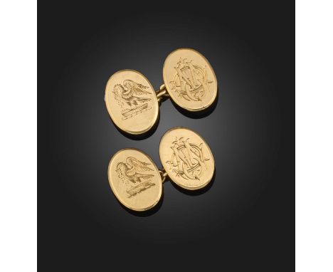 A pair of gold cufflinks, early 20th century, each end of oval design, engraved with the crest featuring Pelican in Her Piety