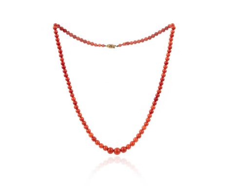 λ A coral bead necklace, graduating from 4.00 to 9.48mm, with a gold lozenge clasp, length 56cm