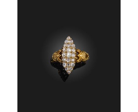 A diamond ring, circa 1889, of navette-shaped outline, pavé-set with cushion-shaped diamonds, to openwork shoulders engraved 