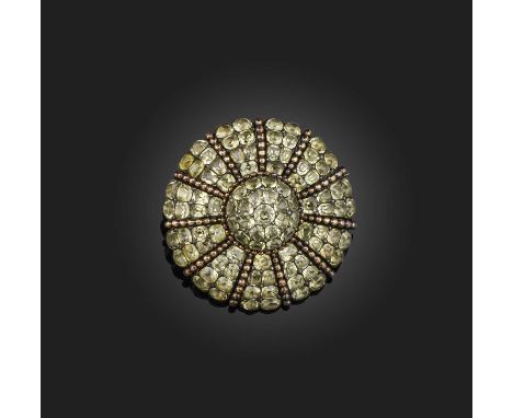 A chrysoberyl brooch, late 18th/early 19th century, designed as a cluster of cushion-shaped chrysoberyls in closed-back setti