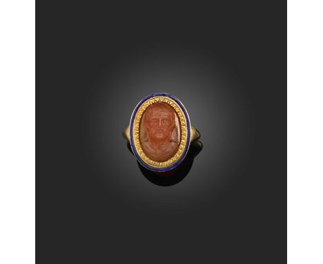 A carnelian and enamel ring, late 18th/early 19th century and later, set with a carnelian cameo depicting a bearded man, poss