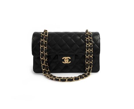 Chanel, a classic black quilted Double Flap bag Gold tone hardware23cm wide by 14.5cm highIncludes authentication card, dustb