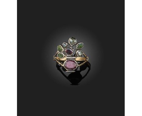 A George III gem-set giardinetto ring, set with emeralds, garnets and diamonds in silver and gold closed-back setting, size K