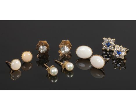 Five pairs of 9ct gold ear studs including opal, paste and cultured pearls.