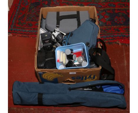 A box of photographic to include Minolta X-300 35mm SLR camera, filters, Cobra flash head, Hakuba tripod.