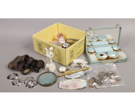 A box of collectables including crested wares, British pre-decimal and foreign coins, brass magnifying glass, cased 19th cent