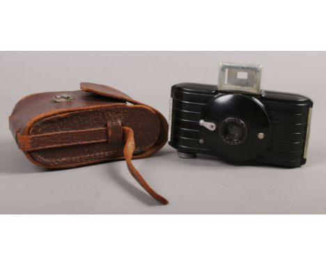 A leather cased 1930s Kodak bullet Bakelite camera.