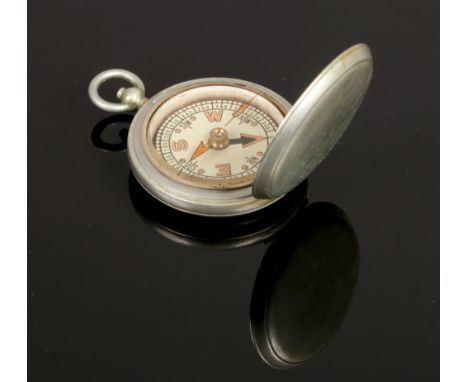 A World War II F. Barker &amp; Son MK. VI military issue compass.