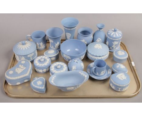 A tray of pale blue Wedgwood Jasperware including vases, trinket boxes and a coffee can and saucer etc.