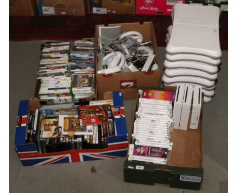 A large quantity of Nintendo Wii gaming console equipment including three consoles, eight platforms, controllers, leads, acce