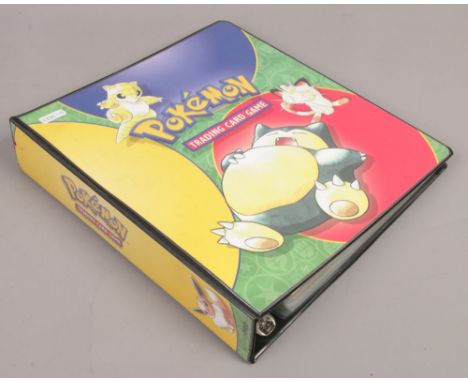 A folder of multiple collections of Pokemon cards to include English, Japanese, first edition examples.