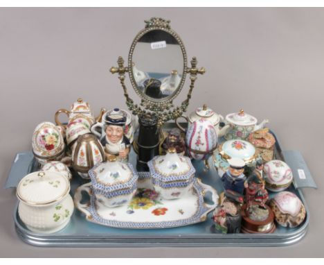 A tray of collectables including porcelain trinket boxes, bonbonnieres, Britain's lead Macgregor figure and decorative mirror