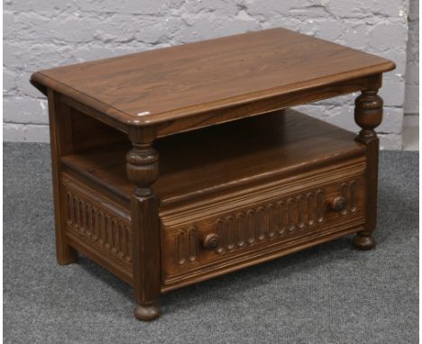 An Ercol Warwick drop leaf corner unit with single drawer.