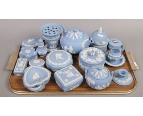 A tray of pale blue Wedgwood Jasperware including cache pot, teapot and powder bowl etc.