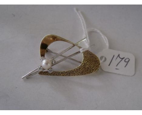 A modernist 14ct gold diamond & pearl brooch   