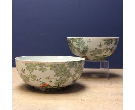 Pair of matched massive punch bowls by de Gournay with central holes formed at manufacture to the bases to enable their use a
